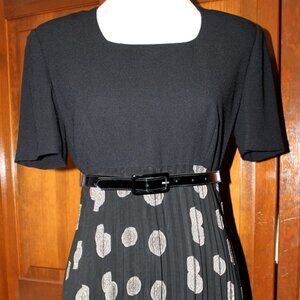 Dress, black top, black pleated bottom half w/design. CHAUS petite dress, size 4